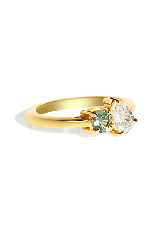 The Toi Et Moi Ring with 0.6ct Pear Cultured Diamond & 0.78ct Round Green Sapphire