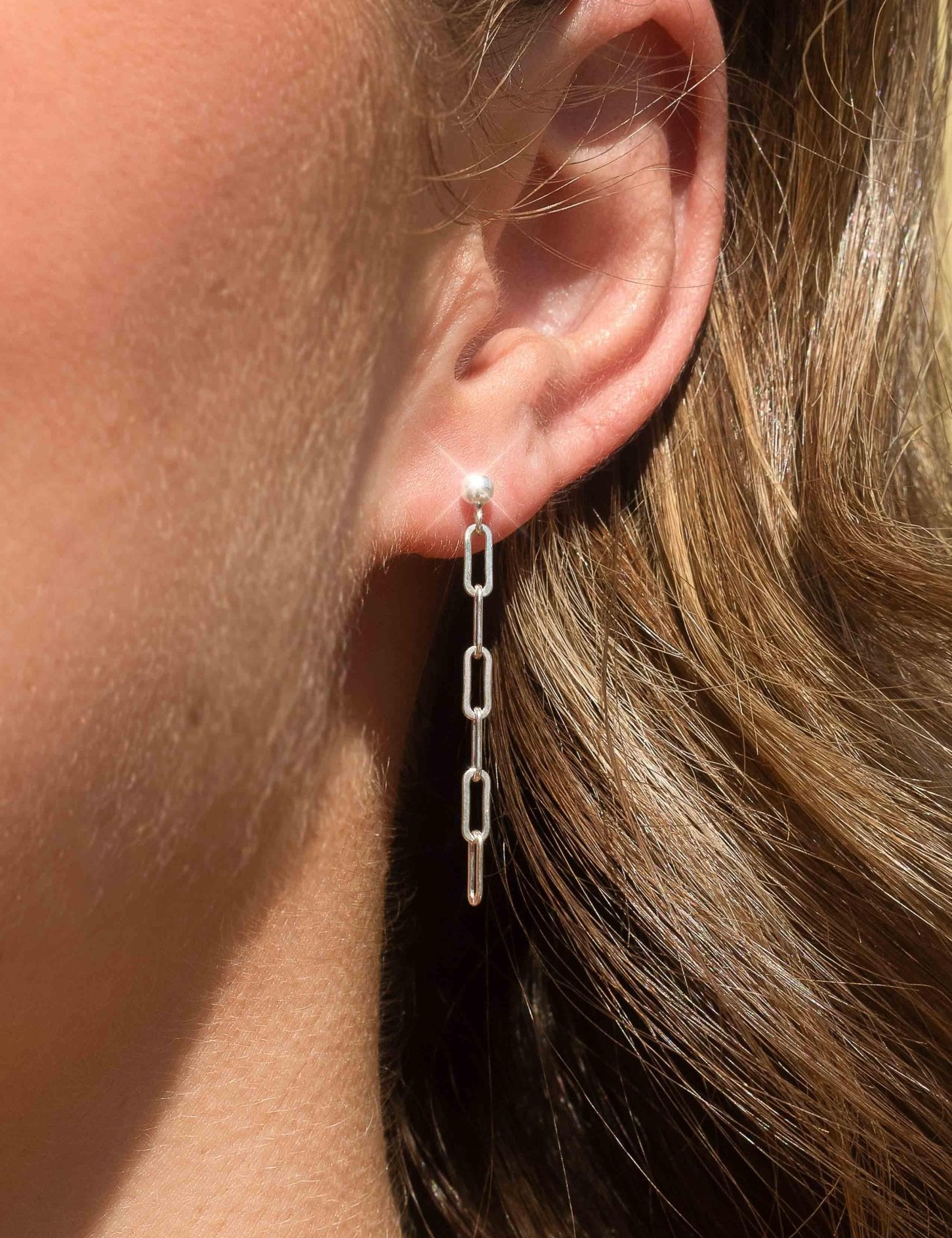 The Theia Silver Drop Earrings - Molten Store